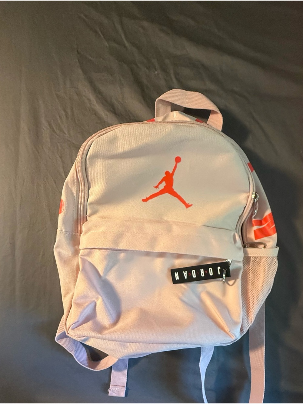 Jordan Light Pink Backpack with Orange Jumpman